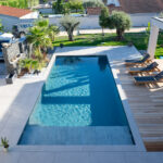 vue piscine maison contemporaine en U